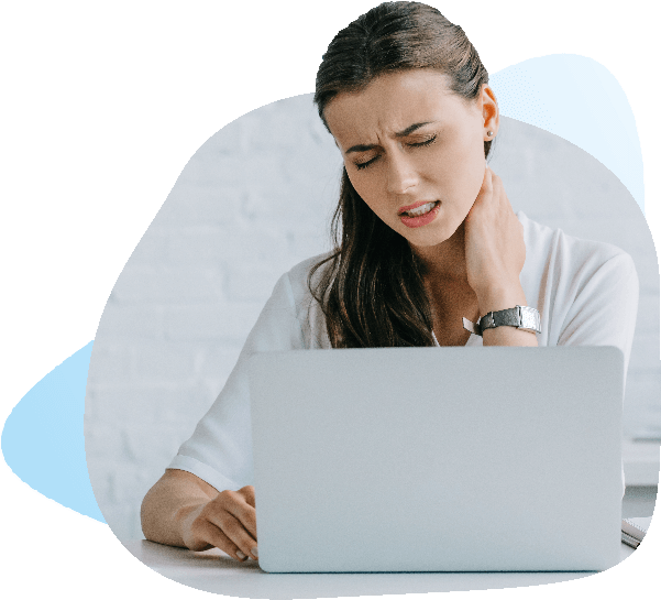 Women sitting in front of laptop is rubbing her neck due to neck pain